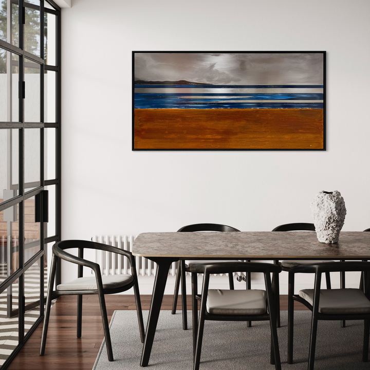 The artwork 'Where Land Meets Sky IV#2' by Nicki Adani features a striking horizontal composition with rich rust-orange terrain beneath vibrant blue water bands, crowned by stormy gray skies. Mixed media on steel creates dramatic textural contrasts in this contemporary landscape abstraction capturing the essence of earth and water meeting horizon. By Nicki Adani.