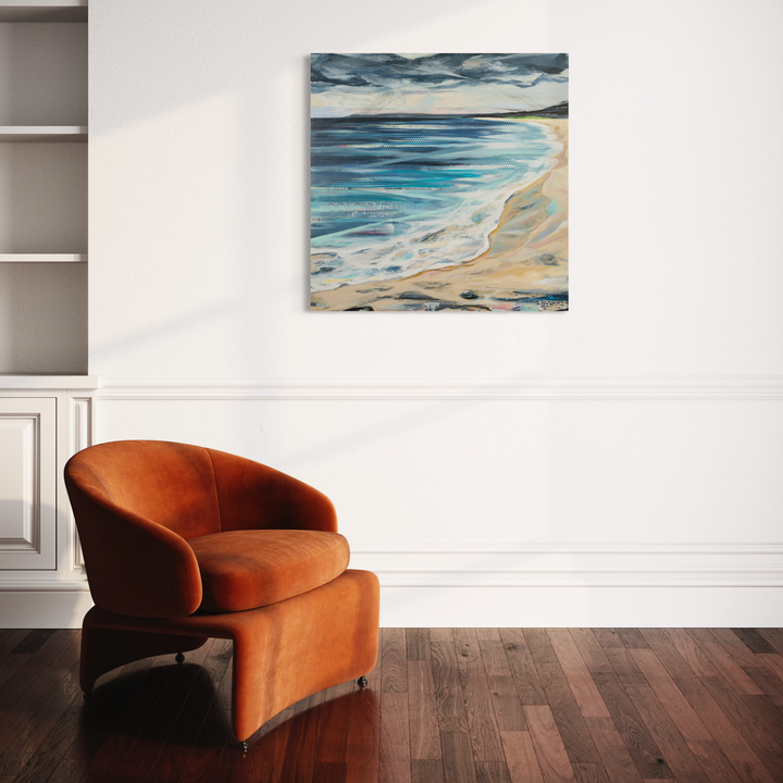 The artwork 'Makena' by Nicki Adani captures a serene coastal landscape with swirling turquoise and azure waves meeting a sandy beige shoreline beneath dramatic stormy clouds. Mixed media on wood panel creates rich textural effects, bringing dynamic movement to the ocean scene. The 36x36 inch composition masterfully blends cool maritime tones with warm beach hues.