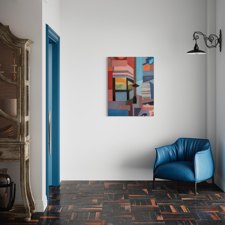 The artwork 'Night Cafe' features geometric abstract shapes in vibrant coral, blue, and peach tones, creating a modern composition on canvas. The painting displays angular forms and architectural elements arranged in a dynamic pattern, complementing contemporary interior spaces. Oil on canvas, 40x30 inches by Chelsie Sunde.