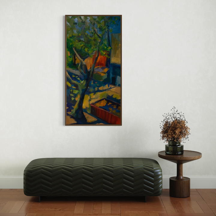 The artwork 'Sycamore' by Darren Singer features a vibrant oil painting on birch wood depicting a majestic tree with bold blues and greens in the canopy. Rich orange and earthy tones illuminate the background, creating a dynamic contrast. The semi-abstract composition captures the tree's organic form against geometric architectural elements, measuring 48x24 inches. By Darren Singer.