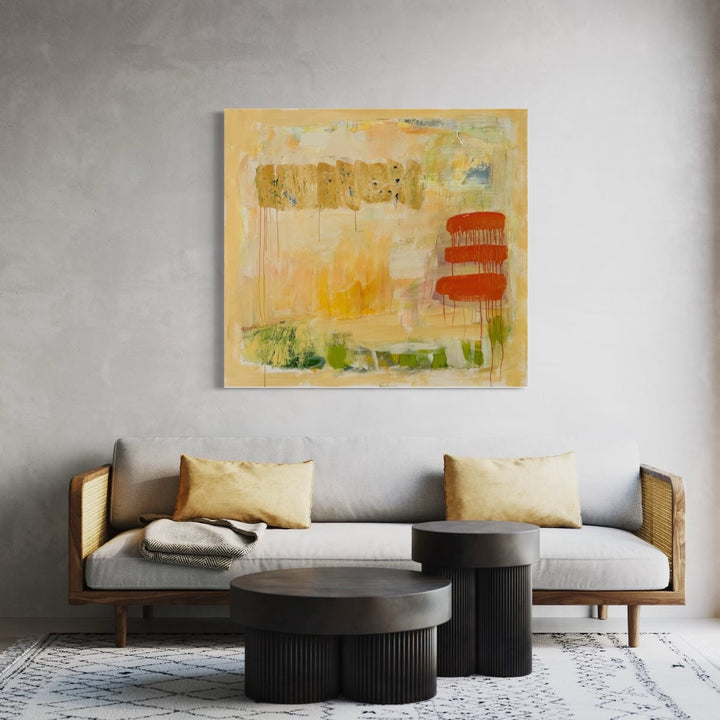 The artwork 'In the Land of Milk and Honey #1' by Petra Nimtz features an abstract composition with warm honey-gold tones, contrasting rust-red geometric blocks, and subtle green accents. The oil on linen painting showcases expressive brushstrokes and dripping techniques, creating a luminous, atmospheric effect against a creamy background, measuring 45x49 inches by Petra Nimtz.