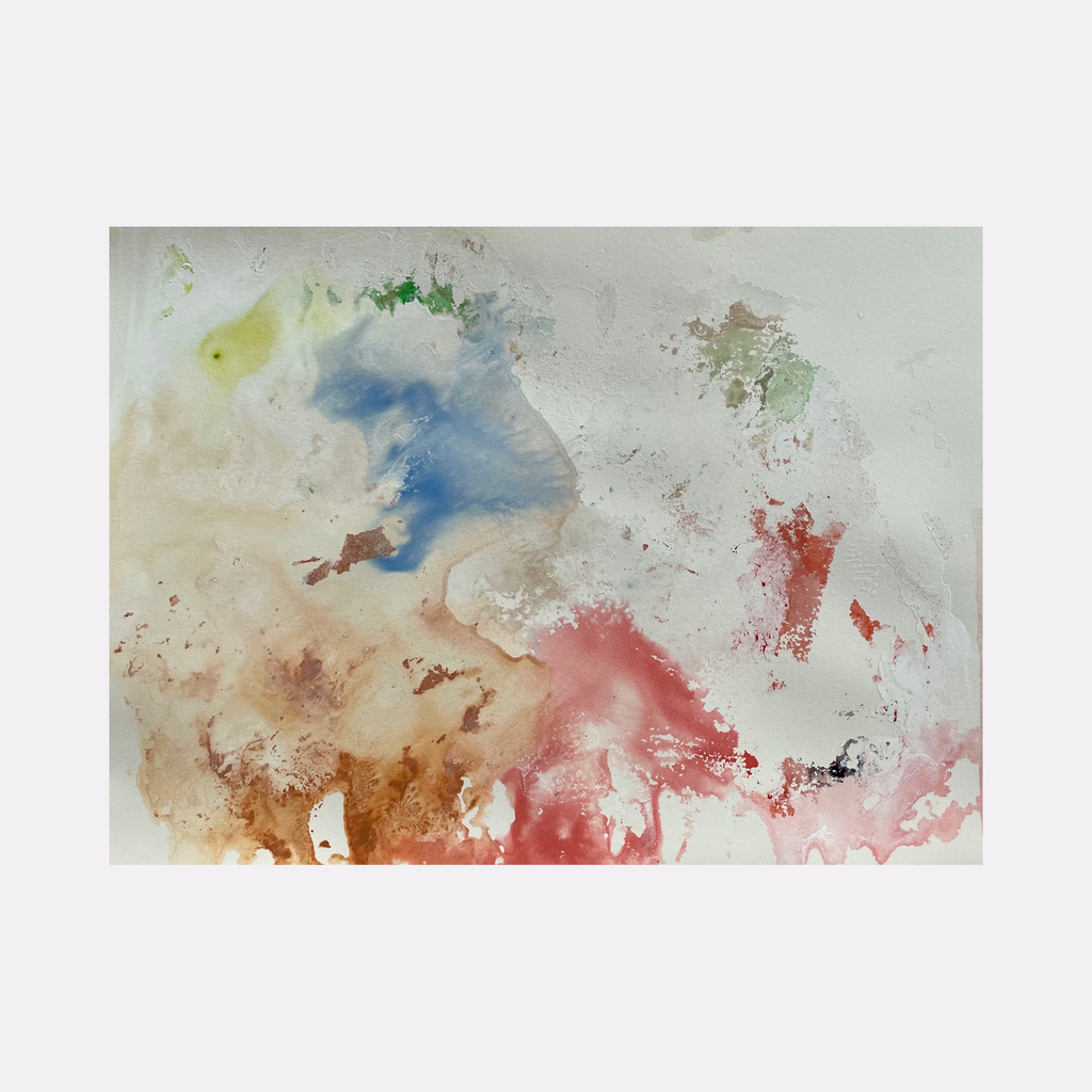 The artwork 'Re.lease #27' by Dina AZ Salem features ethereal watercolor-like effects in acrylic on paper, with flowing transitions between soft blue, coral pink, and earthy brown tones. Abstract splashes and gentle color diffusions create a dreamy, atmospheric composition, complemented by subtle touches of yellow and green at the edges. Unframed 9x12 inches.