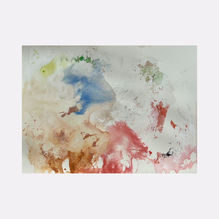 The artwork 'Re.lease #27' by Dina AZ Salem features ethereal watercolor-like effects in acrylic on paper, with flowing transitions between soft blue, coral pink, and earthy brown tones. Abstract splashes and gentle color diffusions create a dreamy, atmospheric composition, complemented by subtle touches of yellow and green at the edges. Unframed 9x12 inches.