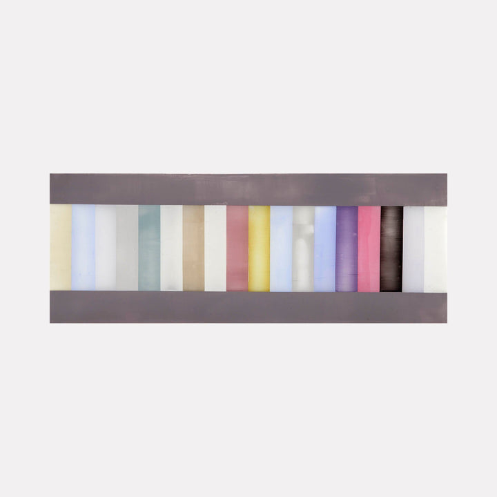 The artwork 'Each of the colors of winter cocooned by all of the colors of winter' by Debra Ramsay features vertical stripes in muted pastel hues including soft yellows, blues, mint greens, beiges, and pinks, framed by dark gray horizontal bands. The acrylic on polyester resin film creates a subtle sheen across the minimalist composition.