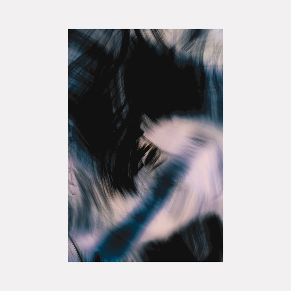 Indigo Dragon I by Chunbum Park: Abstract digital photograph featuring dynamic swirls of deep indigo blue and ethereal white, creating a fluid, dreamlike motion effect against a black background. The contrasting colors and blurred movement suggest a mystical dragon form emerging from darkness, captured in limited edition print.