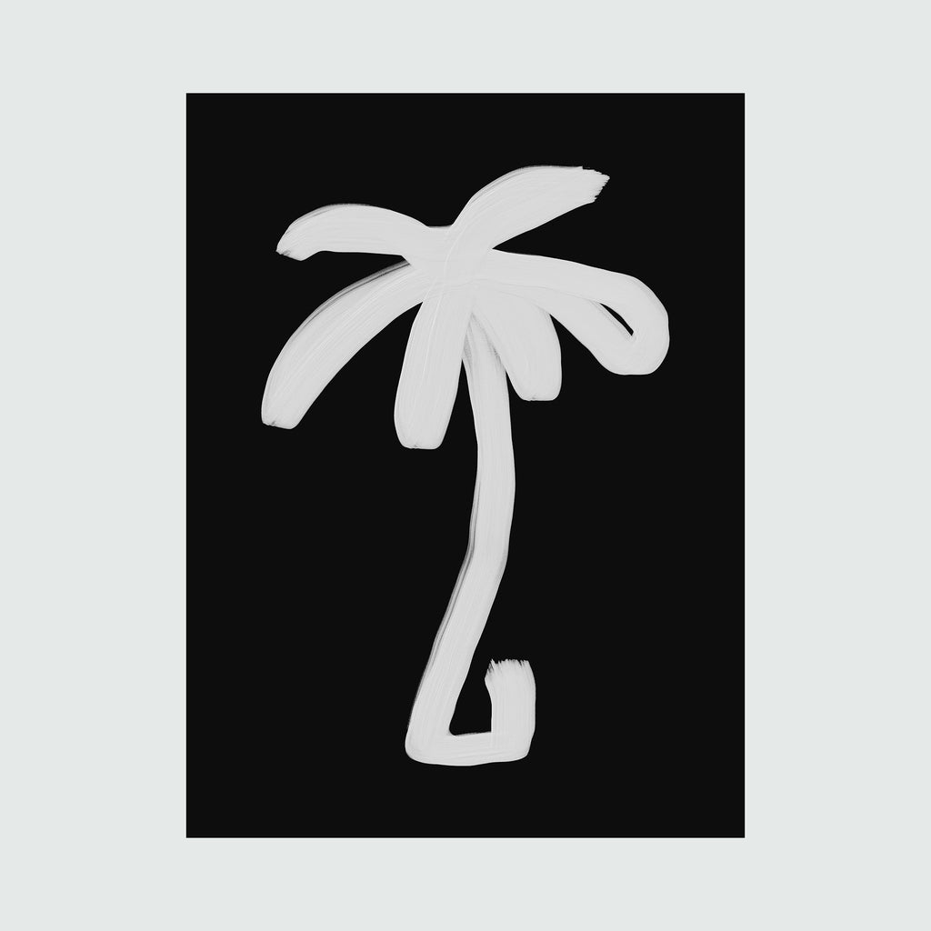 The artwork 'Palm Black And White' by Alina Glotova features a minimalist silhouette of a palm tree rendered in white against a stark black background. The brushstroke style creates a bold, contemporary aesthetic with curved fronds and a slightly curved trunk, capturing the essence of tropical imagery in a modern, monochromatic print.