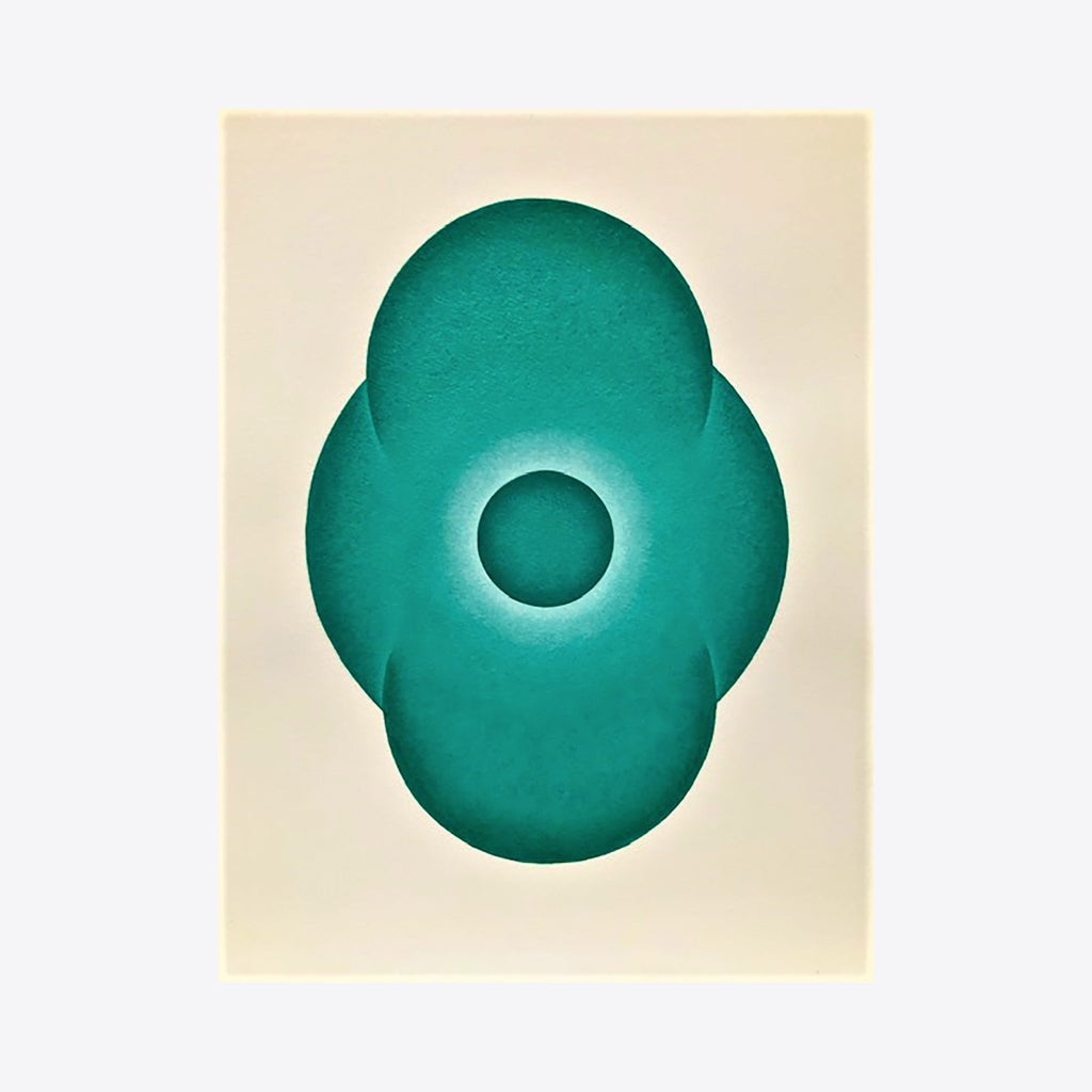 The artwork 'Quad Corona' by Joe Piscopia features a striking emerald green quatrefoil shape with soft, blended edges against a cream background. The design centers on a circular void, creating a mesmerizing depth effect. Painted in acrylic on watercolor paper, the piece showcases smooth gradients and precise geometric symmetry.