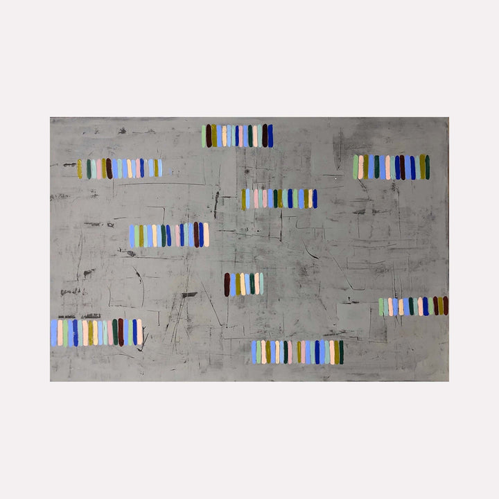 The artwork 'Sequences' by Shira Toren features scattered groups of vertical stripes in blue, yellow, and white arranged across a textured gray background. The abstract composition creates a rhythmic pattern, with each stripe sequence floating independently on the distressed concrete-like surface, measuring 24 x 36 inches. The minimalist style emphasizes geometric forms and subtle color relationships.