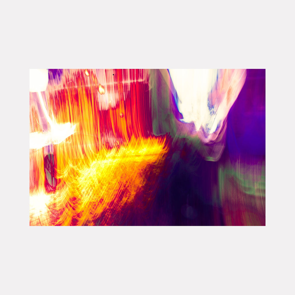 The artwork 'Star Wars' by Chunbum Park features dynamic light trails in vibrant yellow and red hues against a deep purple background. Abstract streaks of light create a sense of motion and energy, reminiscent of laser battles in space. Digital photography captures luminous brushstrokes and ethereal movement in this limited edition print by Chunbum Park.