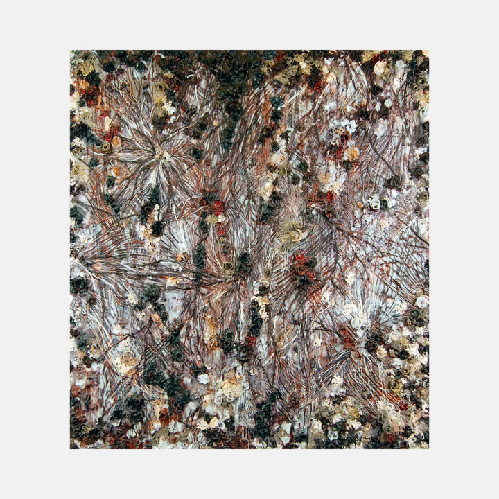 The artwork 'Synaptic Bloom' by Seren Morey features intricate radial patterns resembling neural networks in browns, whites, and deep greens. Created with encaustic on panel, the composition displays organic starburst formations with textural elements that appear to burst from the center, creating a dynamic abstract landscape of interconnected crystalline structures and botanical forms.