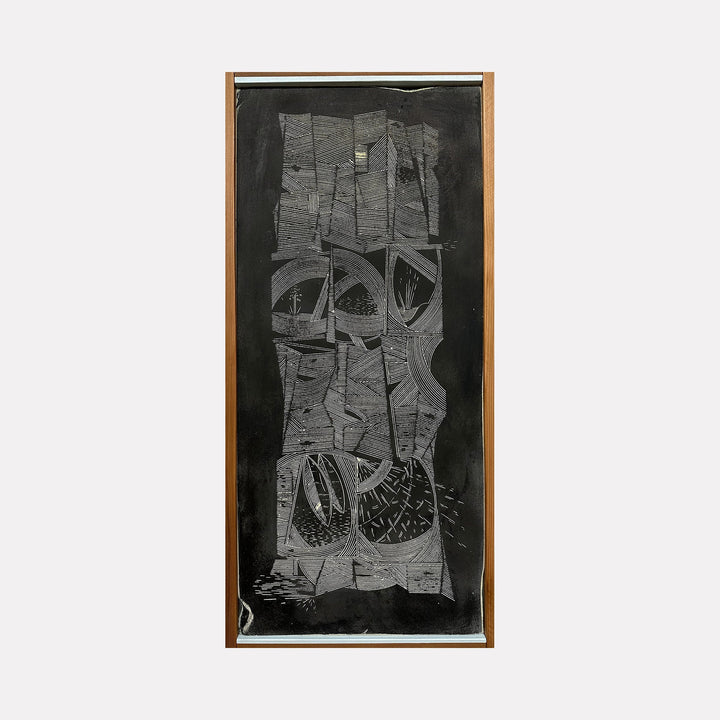 The artwork 'The regional dialect has been crafted over 1000's of years' by Evan Peltzman features abstract geometric patterns in black and gray tones on a wood panel. Intricate lined textures create vertical segments with arched forms and angular shapes, rendered in ink and plaster, displaying a modern architectural aesthetic with contrasting dark and light elements.