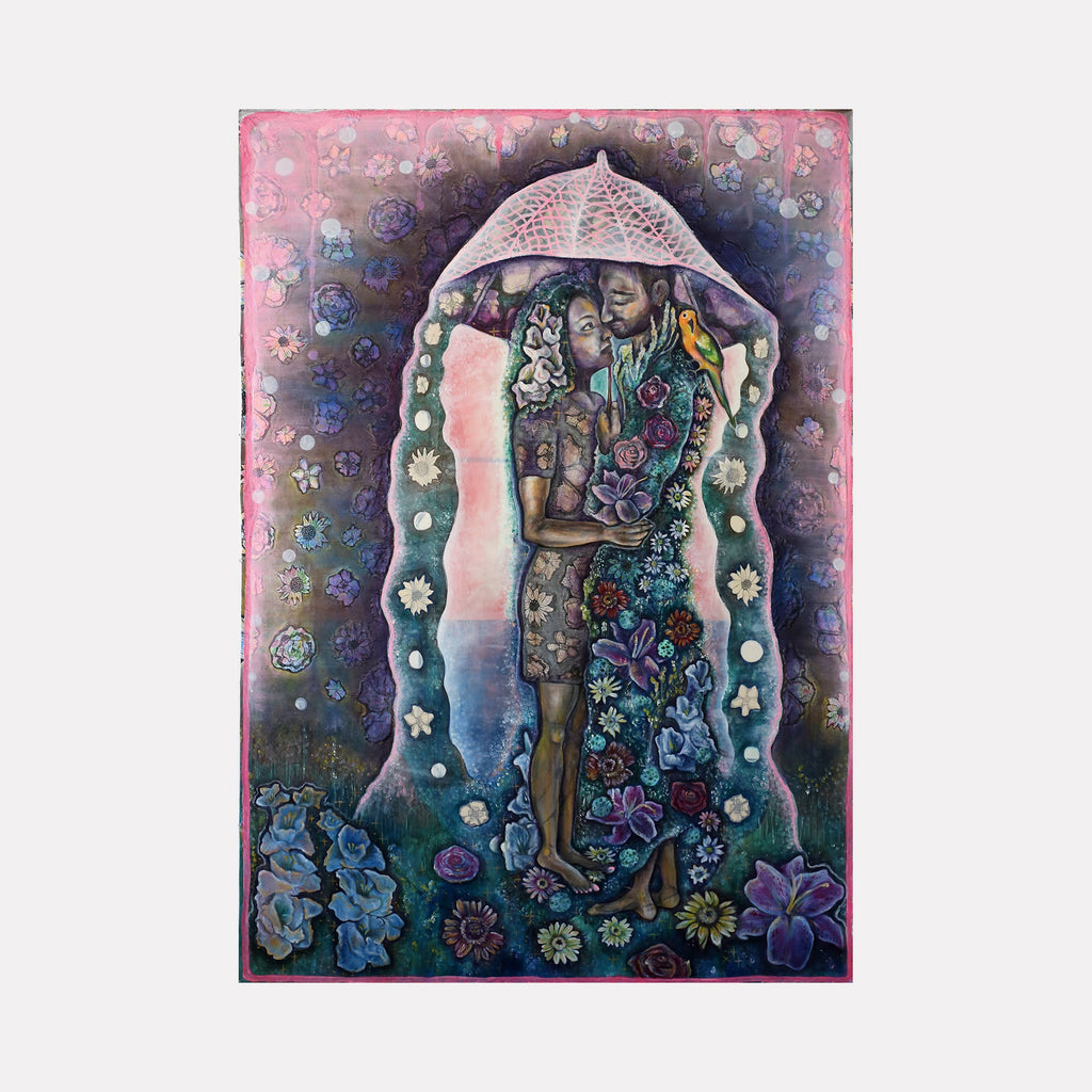 The artwork 'Healers' by Laurie Shapiro features figures under an ornate umbrella-like structure, surrounded by a mystical garden of blue and purple flowers. Screen-printed drawings and hand-sewn details create intricate patterns on muslin, with water-based paints in dreamy pinks, blues, and purples creating a ethereal atmosphere. The floral border frames the central composition.