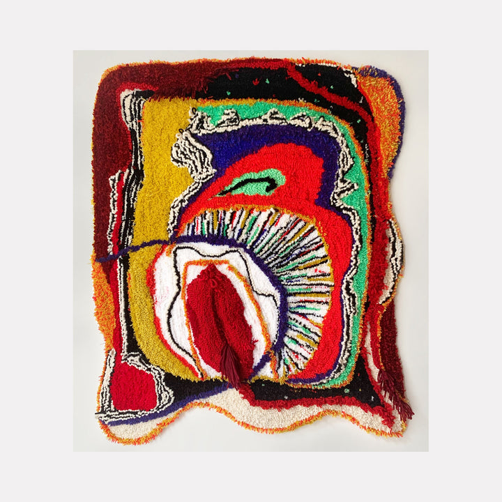 The artwork 'Histerica #1' by Ana Maria Farina features vibrant abstract fiber art with dynamic swirls in red, yellow, blue, and mint green. A central fan-like formation in crimson and white radiates from a deep red core, surrounded by bold curved lines and textural elements created with upcycled fibers on monk's cloth, measuring 34.5 x 27.5 inches.