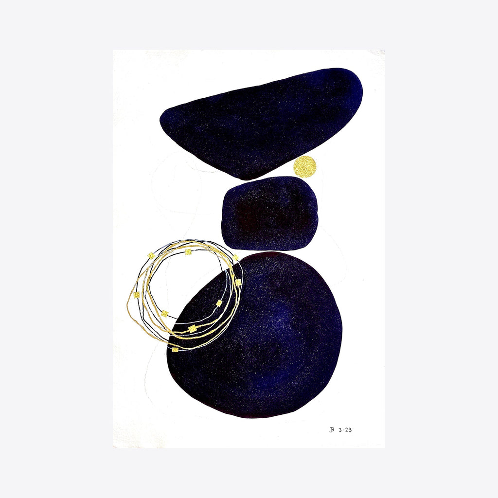 The artwork 'Midnight Balance' by Jocelyn Benford features abstract organic shapes in deep midnight blue watercolor, arranged in a balanced composition with delicate gold circular line work. Three smooth, rounded forms create a vertical stack against white paper, complemented by intertwining metallic threads.