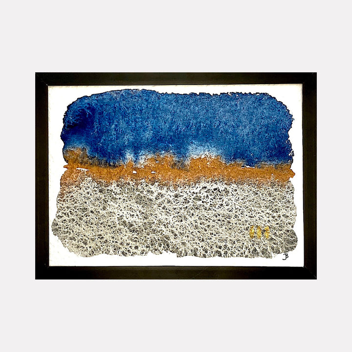 The artwork 'Mood: Tickled' by Jocelyn Benford features abstract watercolor layers with a deep cobalt blue sky, warm golden horizon, and textured silvery-white foreground. The mixed media technique creates a dynamic, speckled effect reminiscent of natural landscapes. The 5x7 piece displays a striking contrast between smooth and granulated paint surfaces.