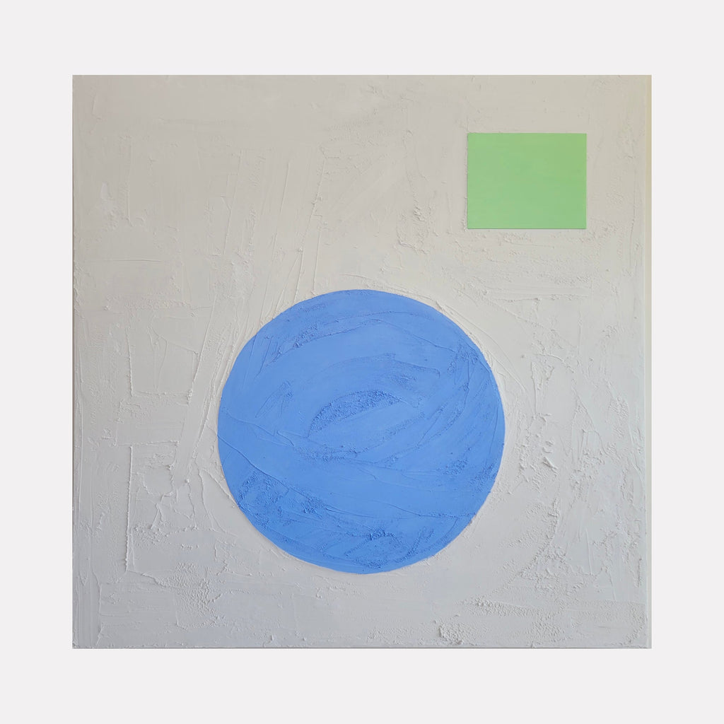 The artwork 'Cotton Candy' by Dina AZ Salem features a minimalist composition with a large blue circular form centered on a textured light gray background. A small mint green rectangle appears in the upper right corner. The plaster and oil painting technique creates a rich, tactile surface with visible brushstrokes across the 48x48 inch canvas.