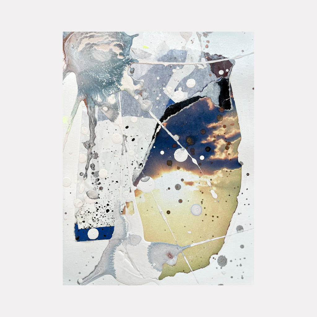Controlled Chaos Study 3 by Renee Phillips features abstract splashes and drips in deep navy blue, soft yellow, and silvery gray tones. Dynamic ink splatters and organic shapes create movement across white archival paper, with strategic negative space and textural elements from mixed media including acrylic and gesso.