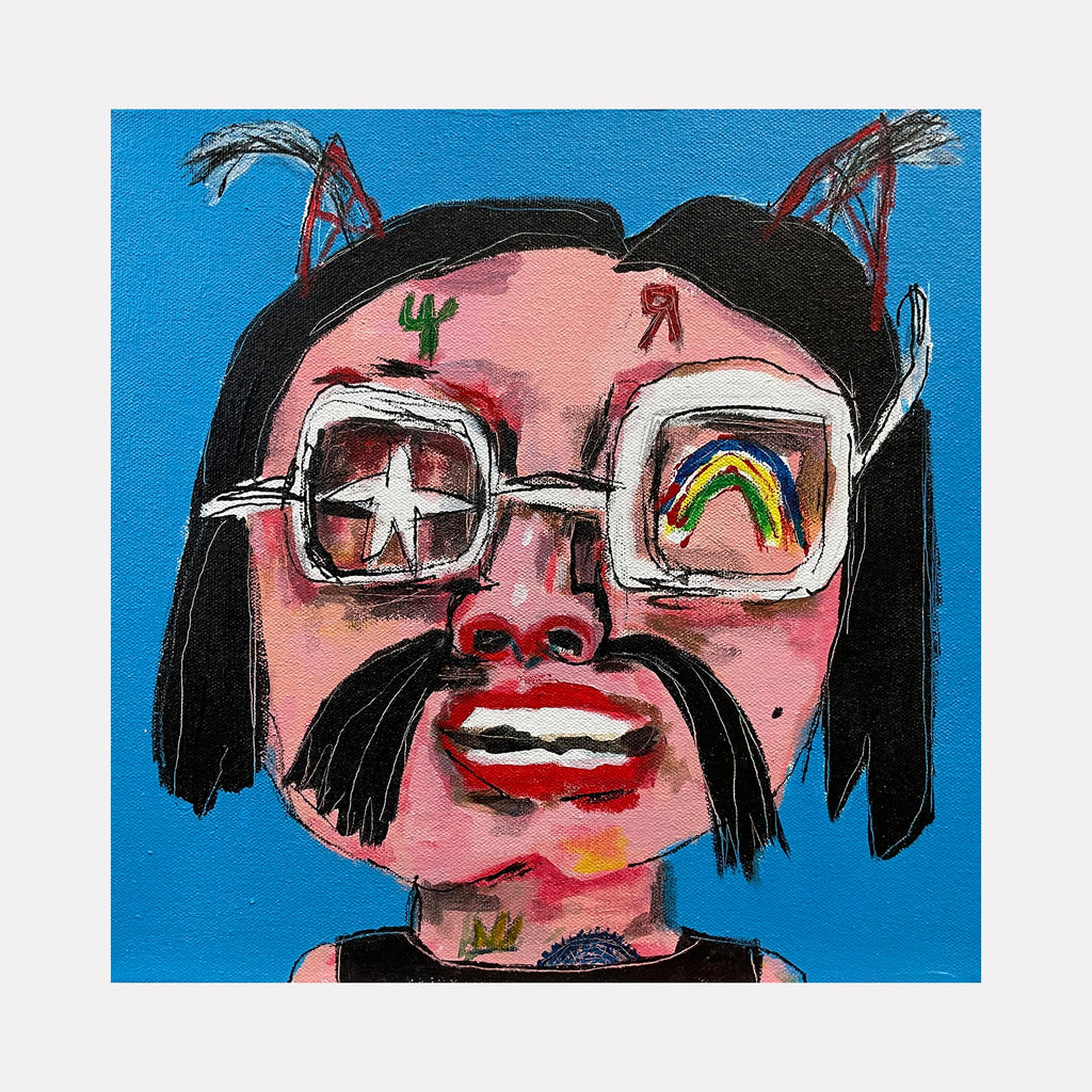 The artwork 'Glam Boy Small' by Andrew Chan features a contemporary pop art portrait against a vibrant blue background. The subject wears distinctive square glasses reflecting a cross and rainbow pattern. The painting showcases expressive brushstrokes in black, pink, and red tones, executed in acrylic on 12x12 inch canvas with a whimsical, neo-expressionist style.