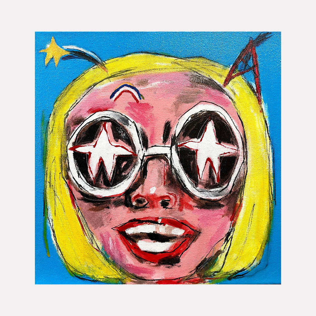 The artwork 'Glam Girl Small' by Andrew Chan features a whimsical portrait with vibrant yellow hair against a bright blue background. Round star-studded glasses frame the facial features, painted in expressive pink and red tones. The 12x12 inch acrylic canvas showcases a pop art style with bold brushstrokes and playful star motifs.