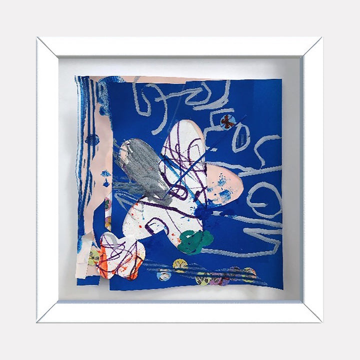 The artwork 'Origami Garden no.10' by Songyi Kim features an abstract mixed media collage with dynamic brushstrokes in cobalt blue, white, and coral pink. Gestural lines and organic shapes create a sense of movement across the composition, enhanced by layered washi tape and paper elements, all contained within a pristine white frame.